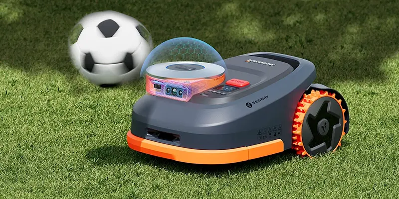 Tondeuse à gazon robot silencieuse (60 dB) dans le jardin